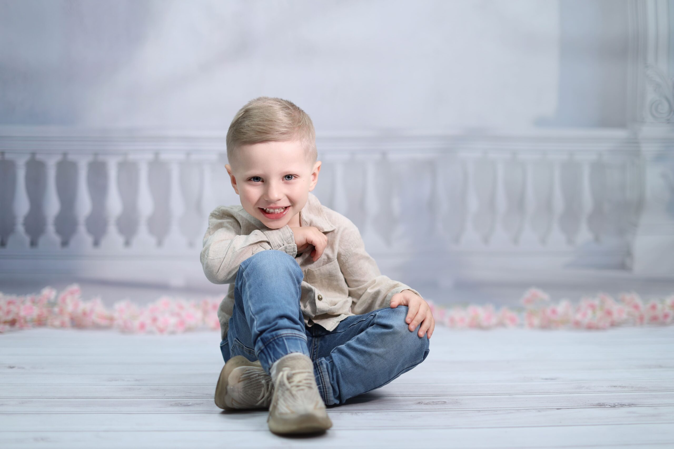 Spring-themed children portrait in outdoor natural setting with soft sunlight