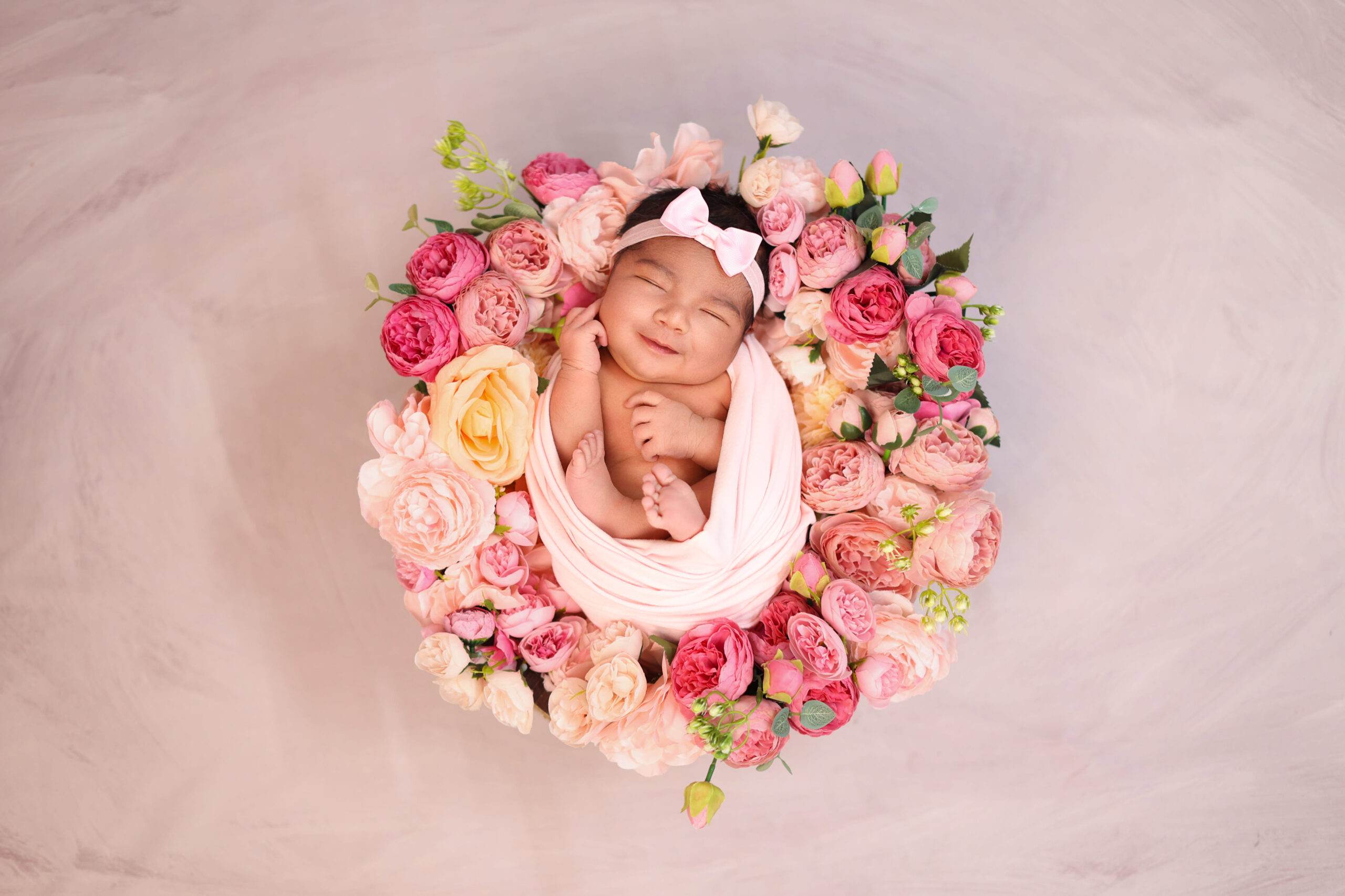 Newborn baby studio portrait with soft lighting