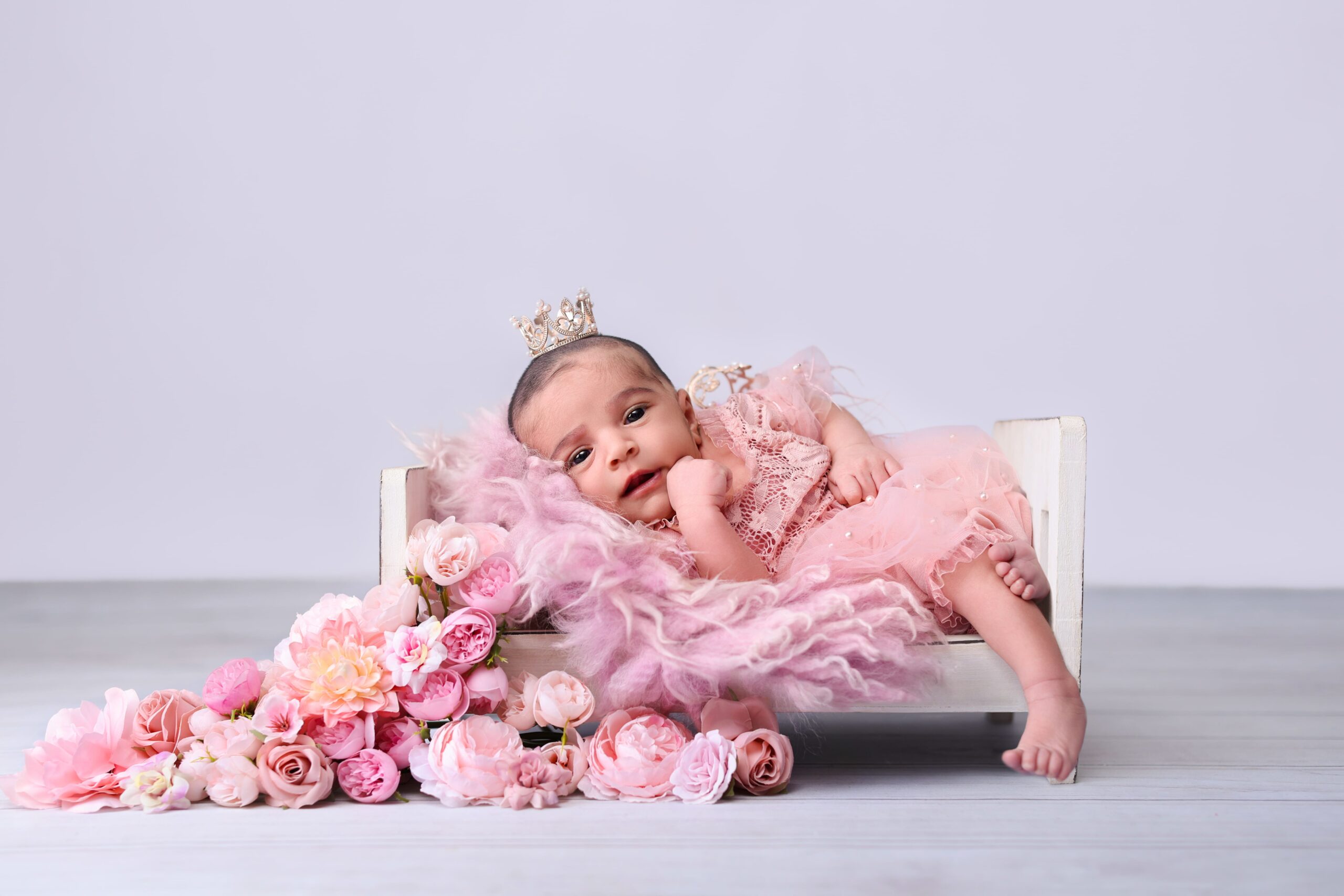 Newborn baby during a studio photography session