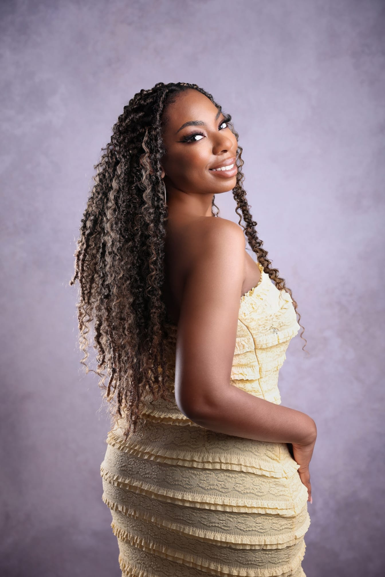 Birthday photography portrait taken in a professional studio with soft lighting and elegant styling