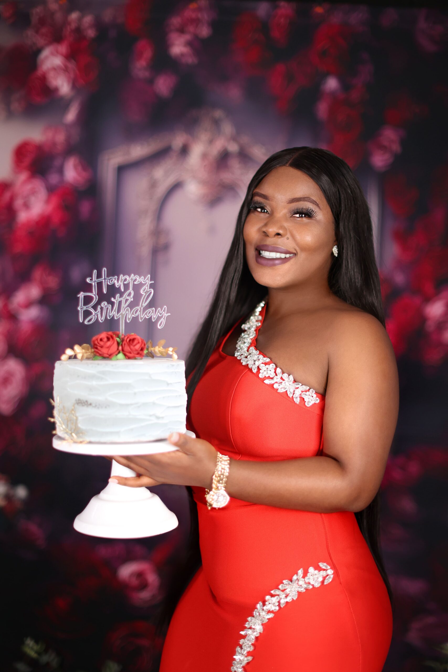 Studio birthday portrait featuring roses for a romantic and elegant photoshoot