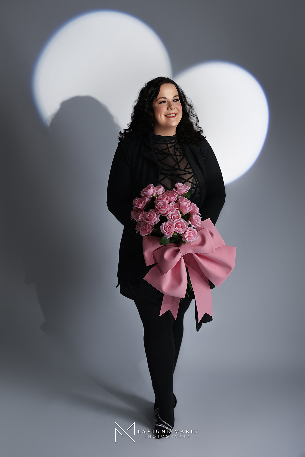 Stylish 30 birthday photoshoot spotlight setup with dramatic lighting in London photography studio