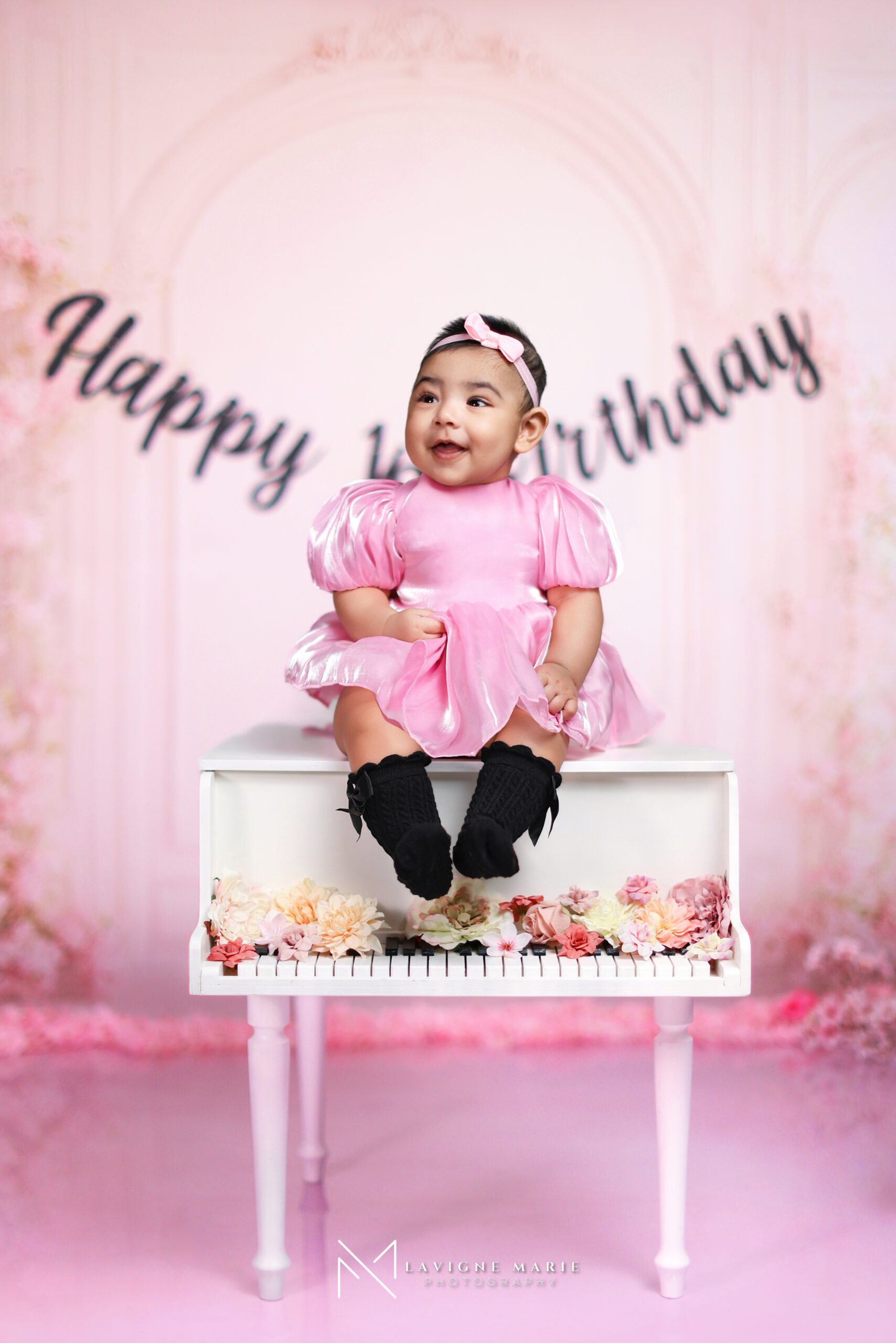 Six month old baby girl studio photoshoot in London with soft lighting and neutral background