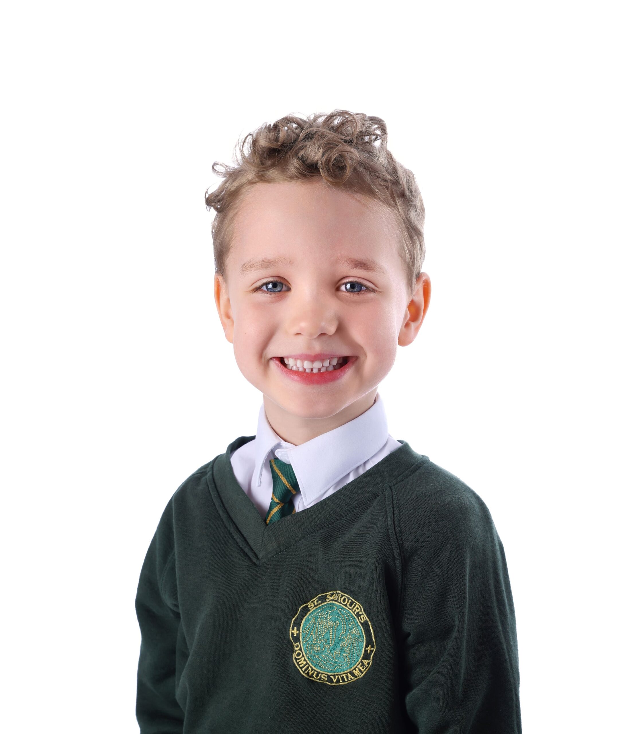 Professional school portrait of a student taken in a London photography studio, featuring natural expression and clean, well-lit background.