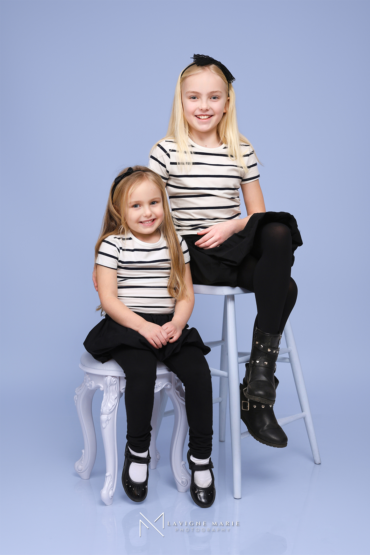 London family studio photography session capturing candid and posed portraits indoors.