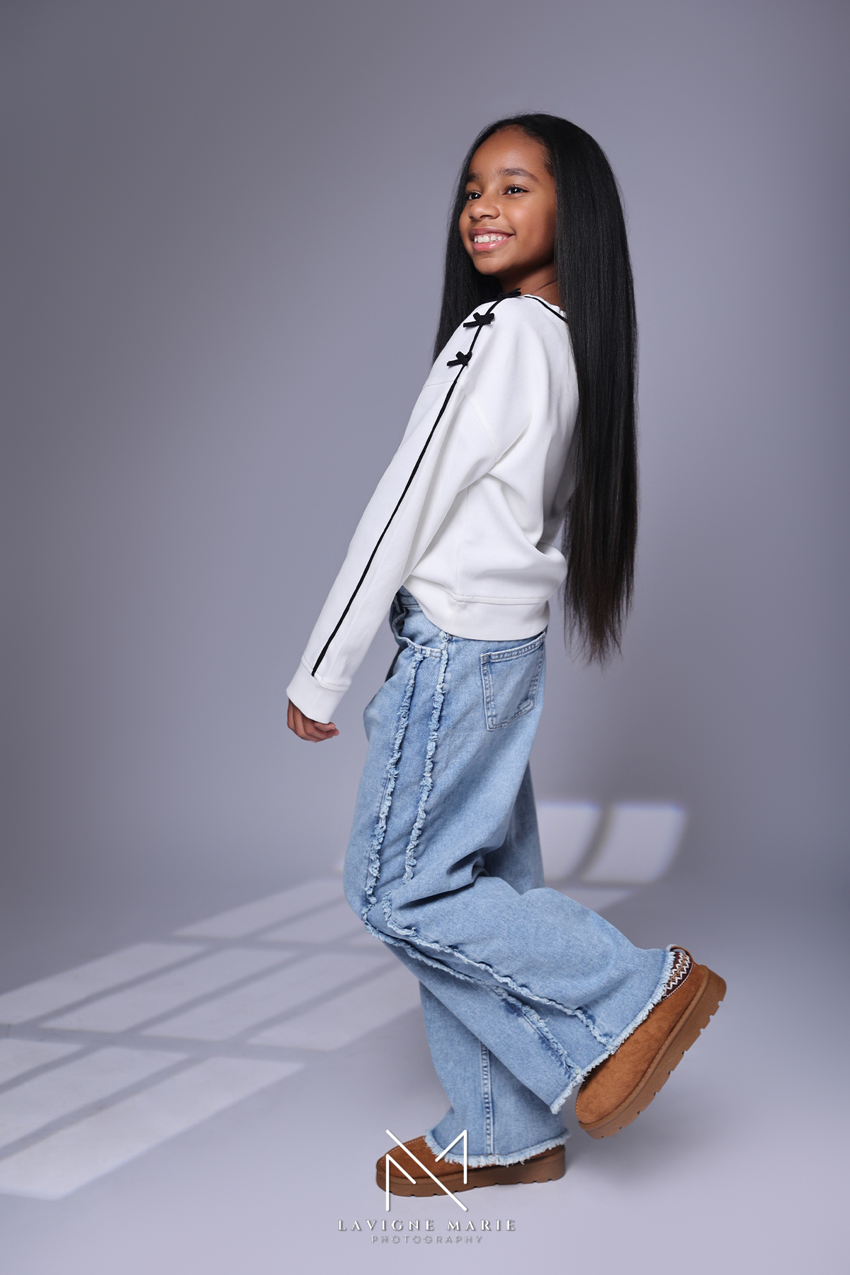 Children model portfolio photoshoot with professional studio lighting and simple background