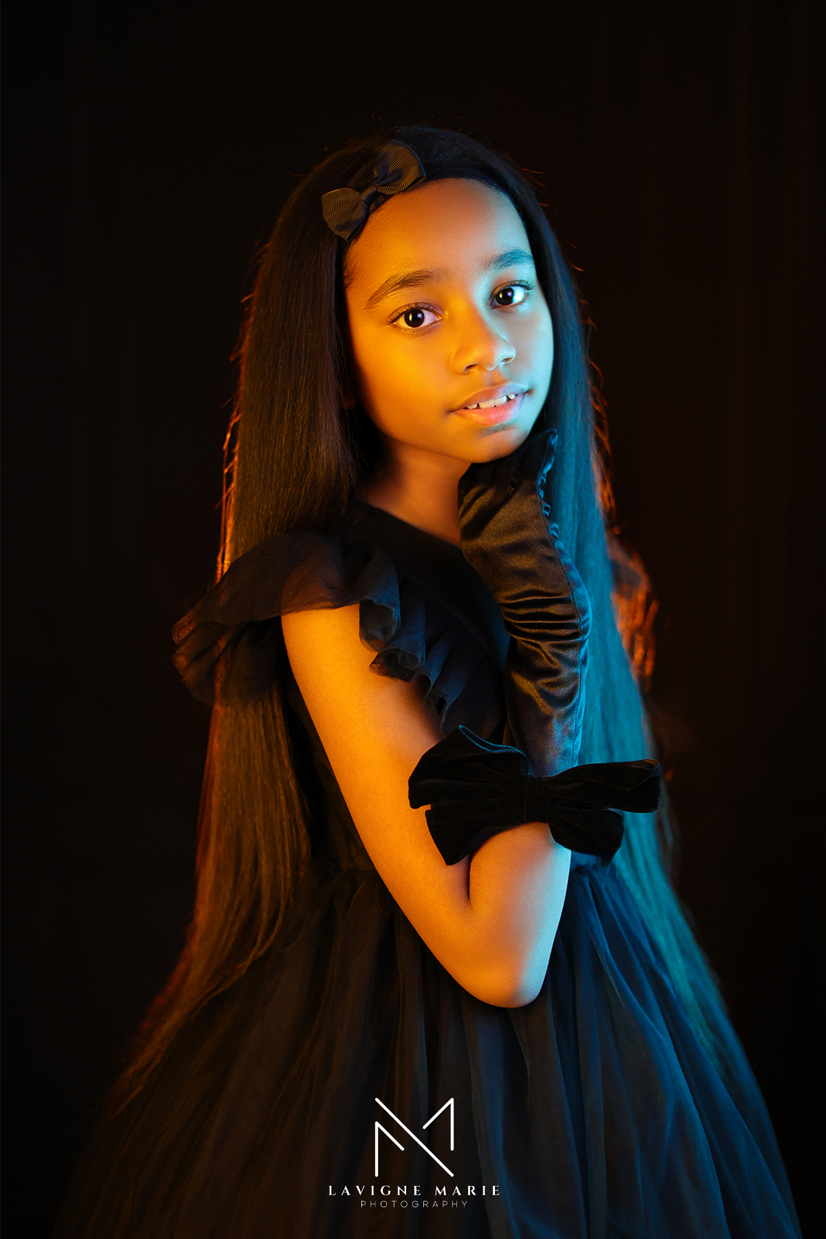 Professional studio children photoshoot for a model portfolio featuring a child posing naturally against a clean backdrop