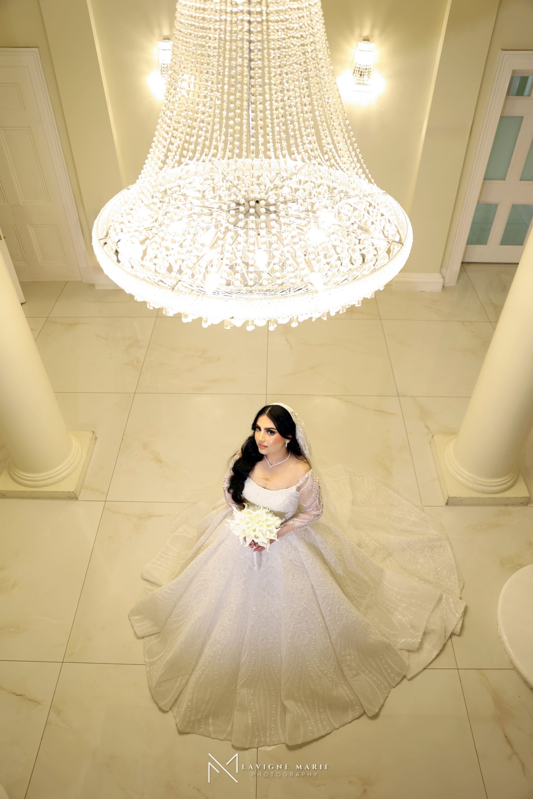 Female wedding photographer documenting a wedding ceremony in East London