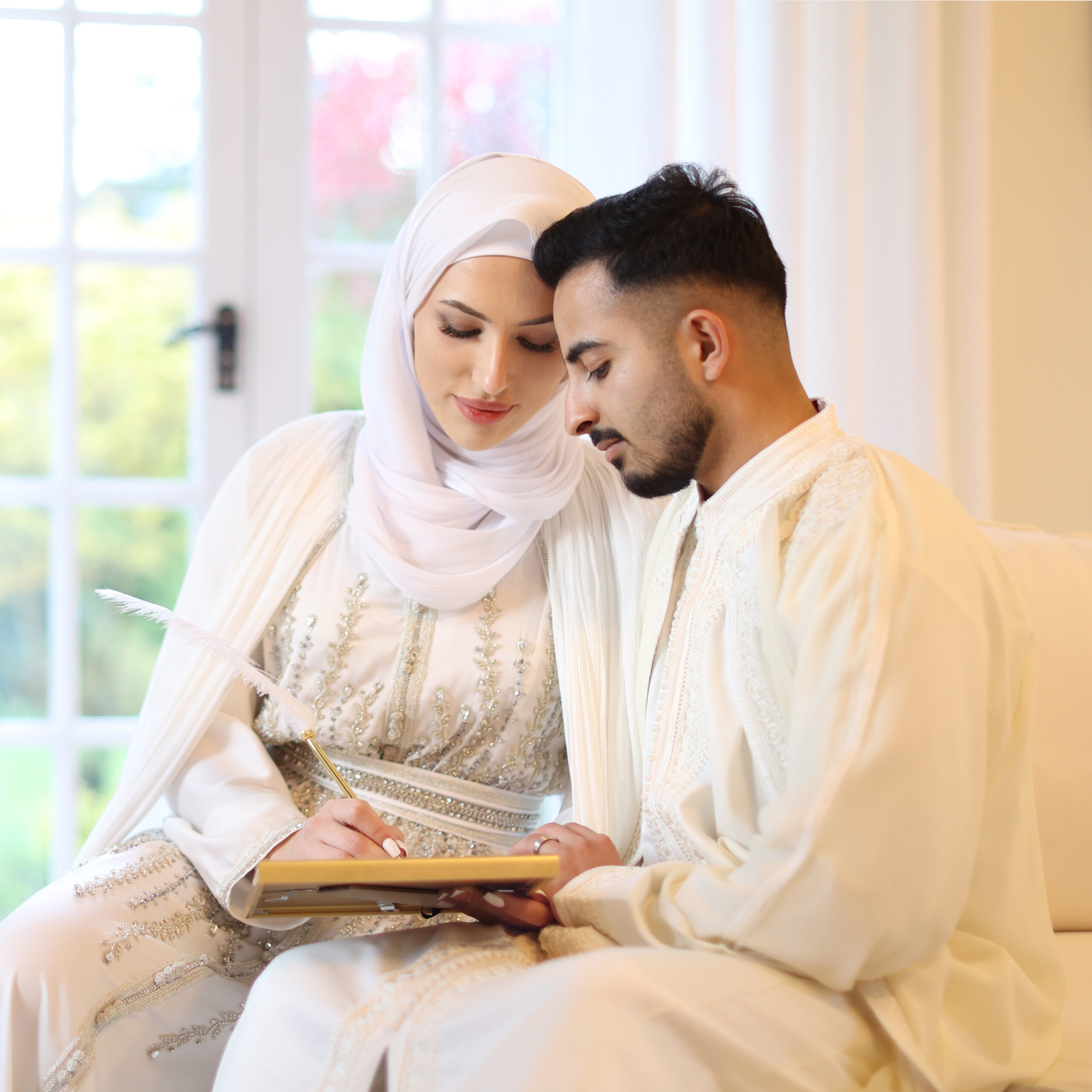 Nikkah ceremony moment with bride and groom during Islamic wedding captured by female photographer in London
