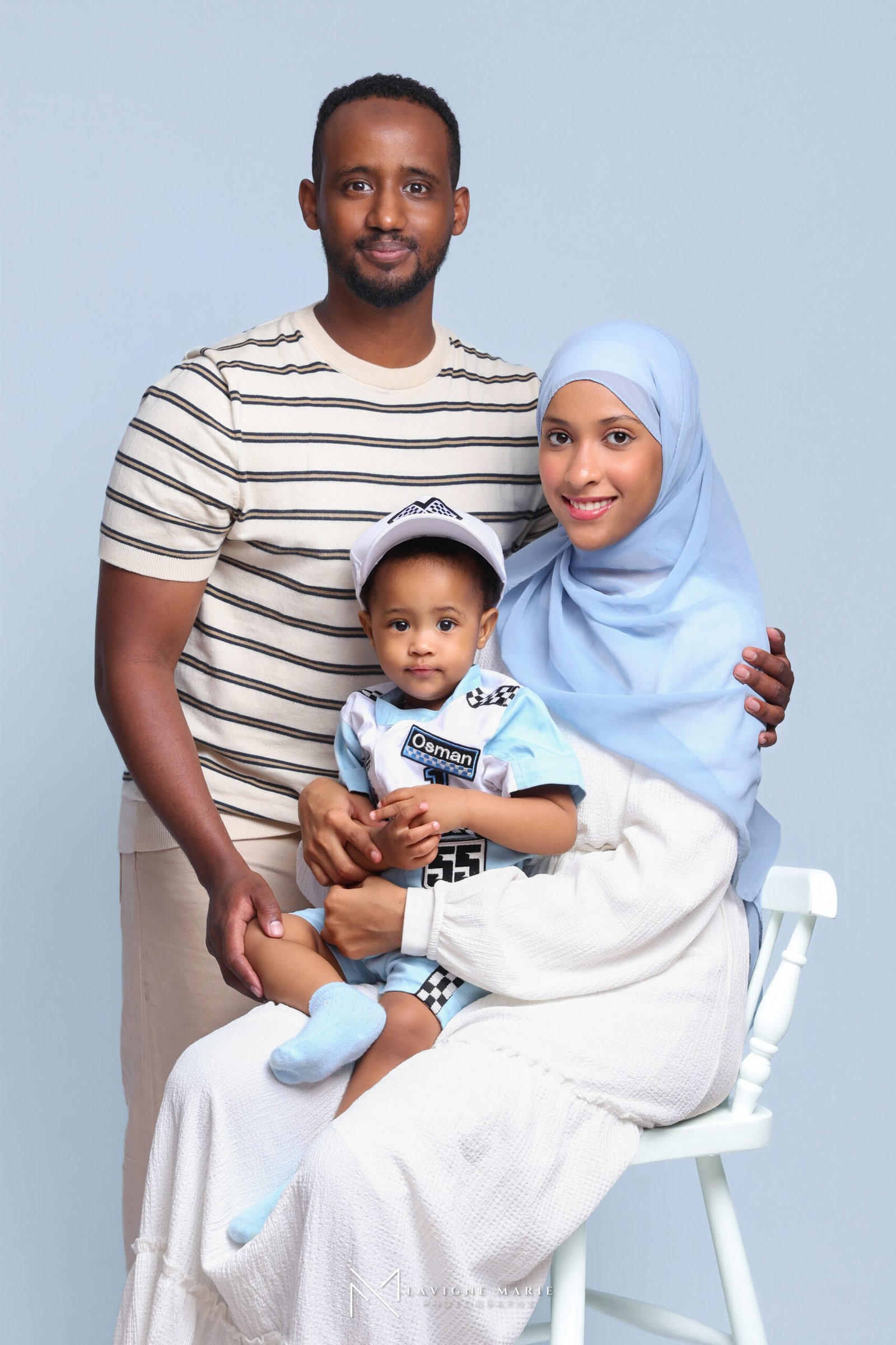 First birthday photoshoot for a baby boy with a joyful cake smash setup by Lavigne Marie Photography