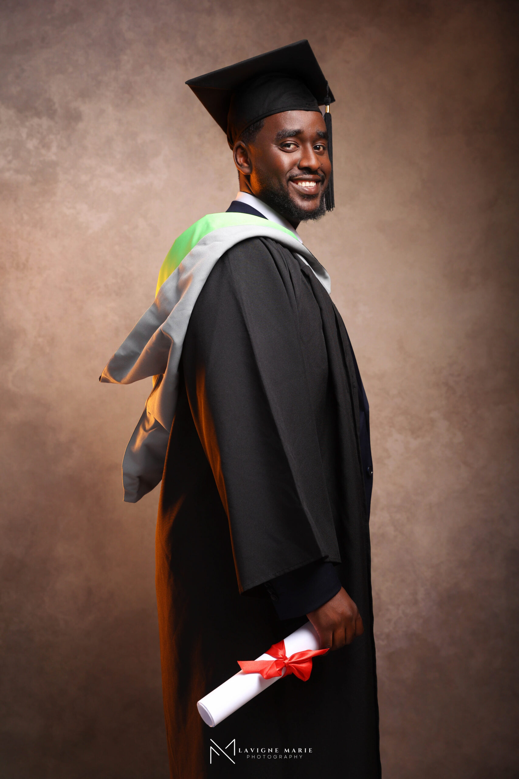 Graduation photographer London by Lavigne Marie, capturing professional portraits for graduates in a studio setting.