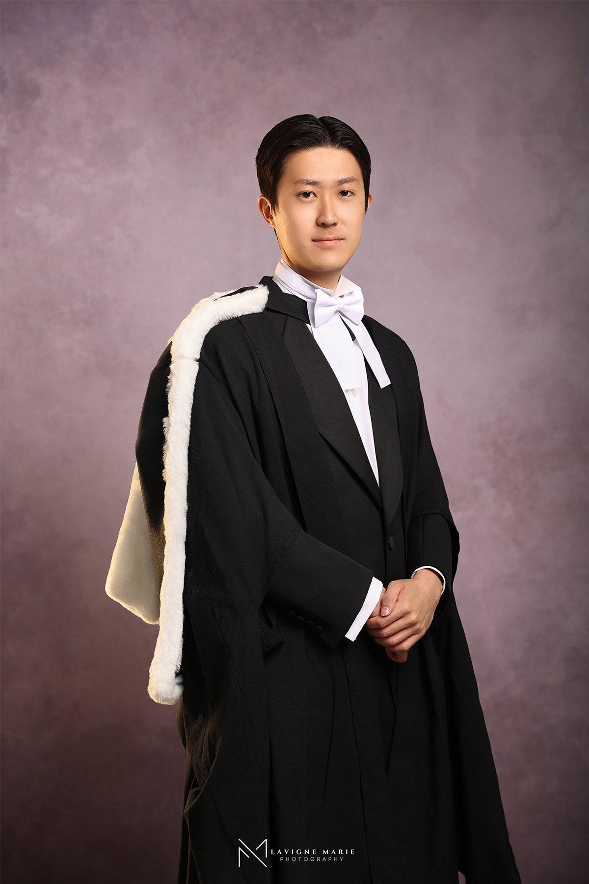 Graduation photoshoot by Lavigne Marie Photography in London, featuring elegant studio portraits for a graduate.
