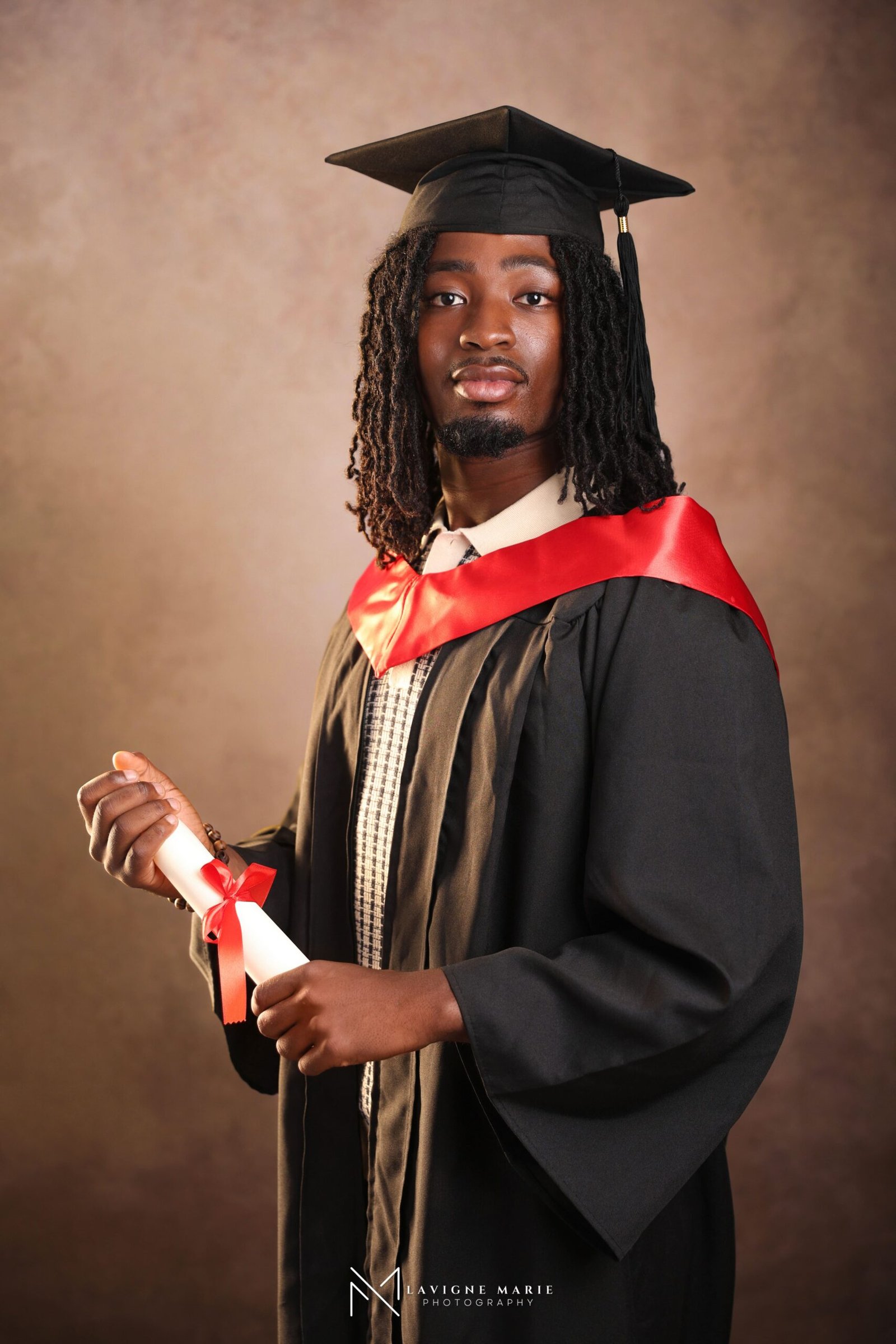Men’s graduation single portrait photographed in a London studio