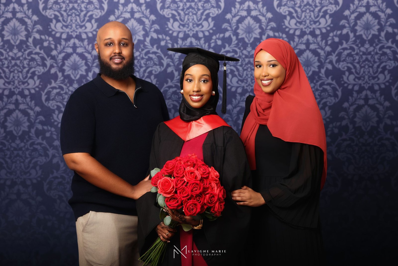 Graduation studio photoshoot with signature university backdrop in London