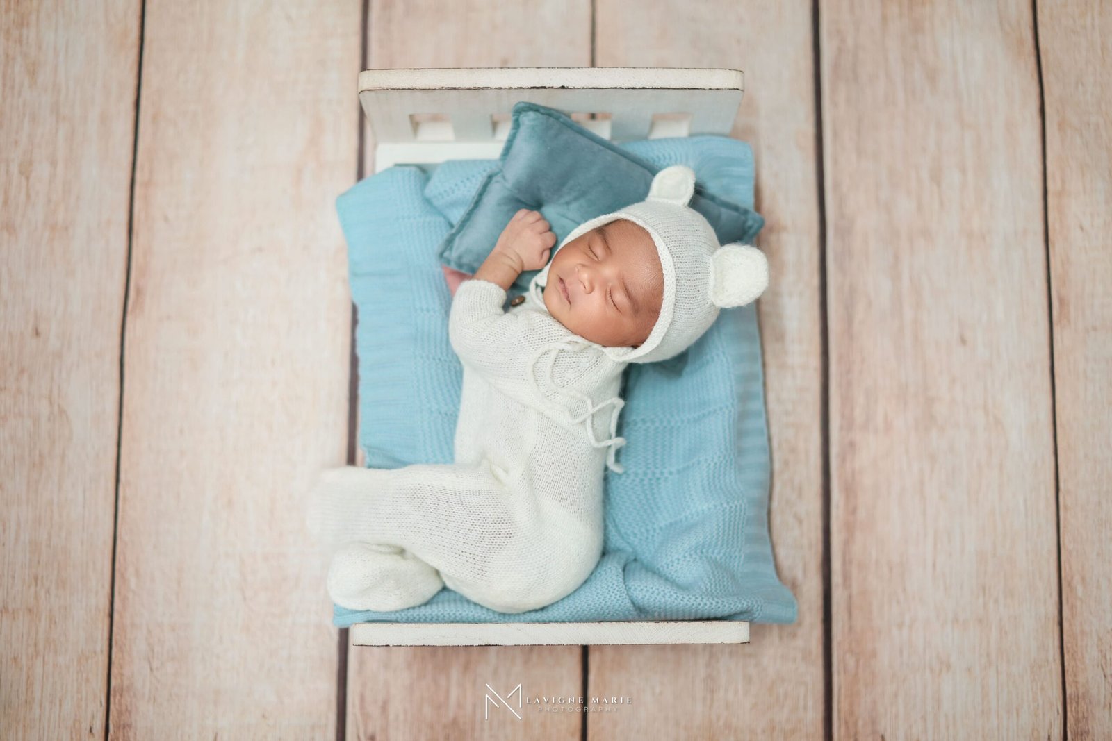 Newborn baby photoshoot in a London photography studio with professional newborn posing