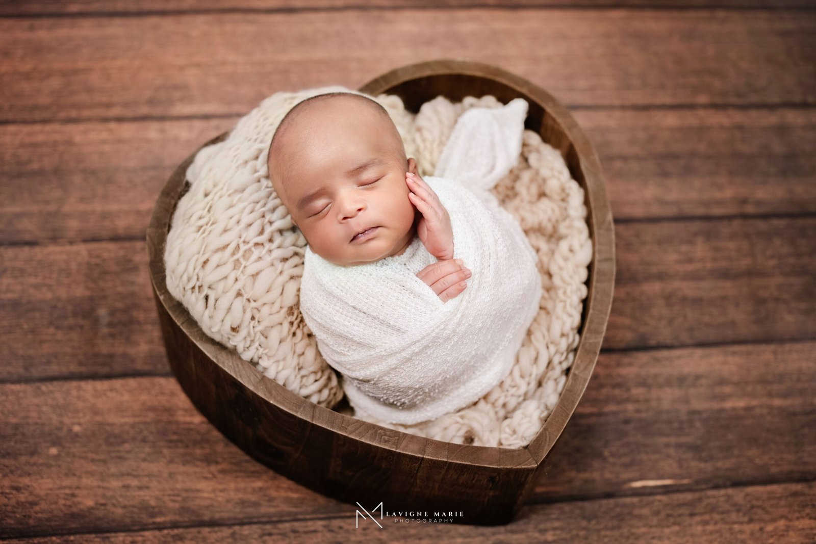 Newborn studio photoshoot in London featuring professionally posed baby photography