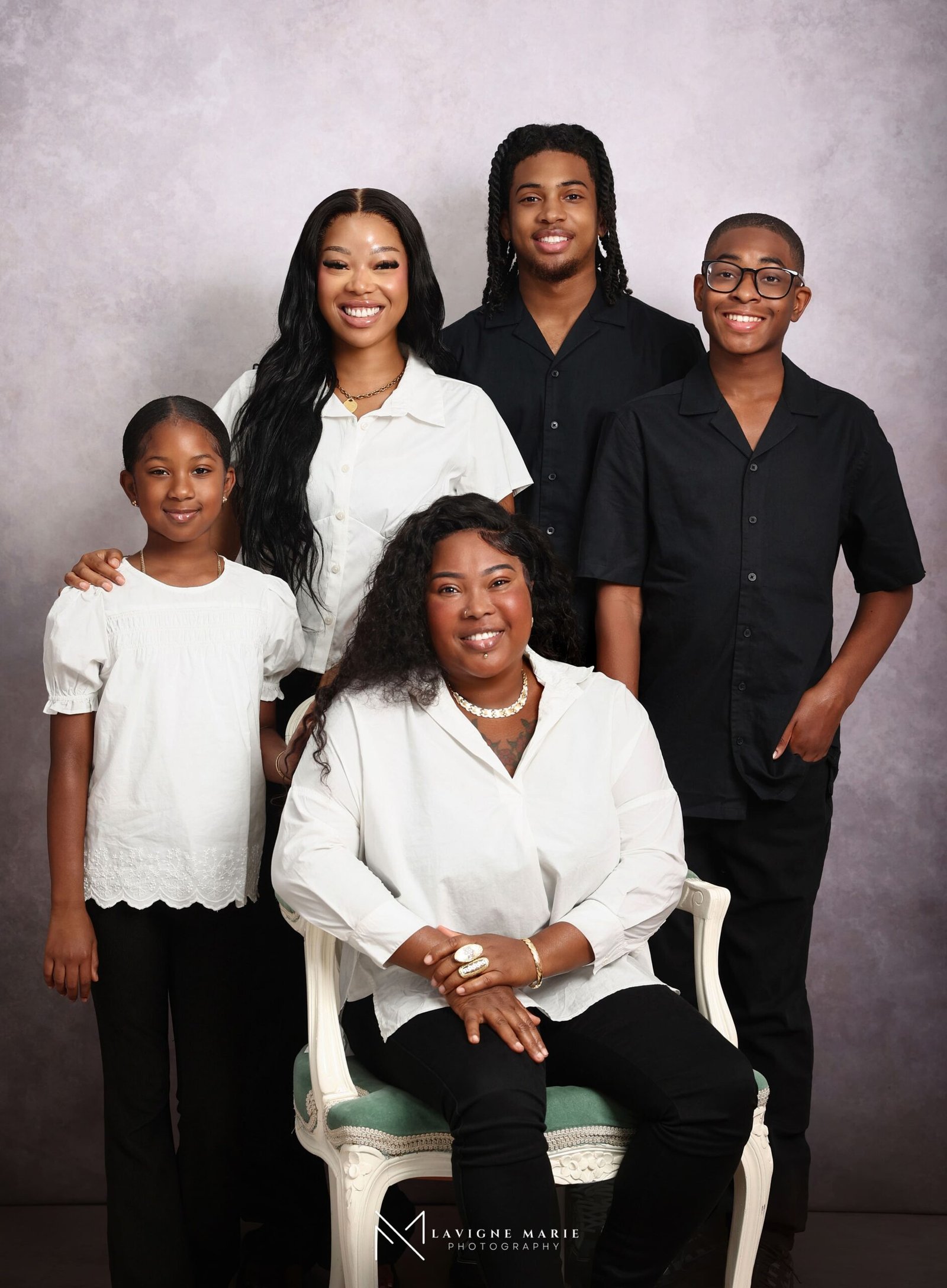 Family celebrating their close bond during a professional family studio photoshoot in London